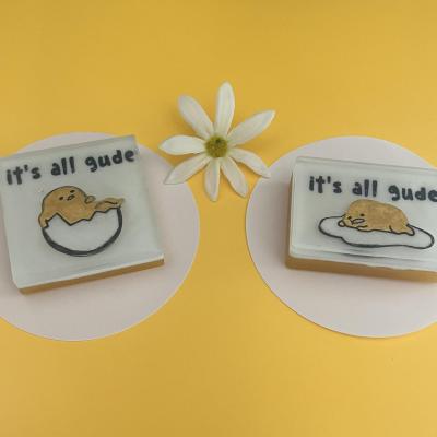 Handmade soap with a kawaii lazy egg that reads “it’s all gude”