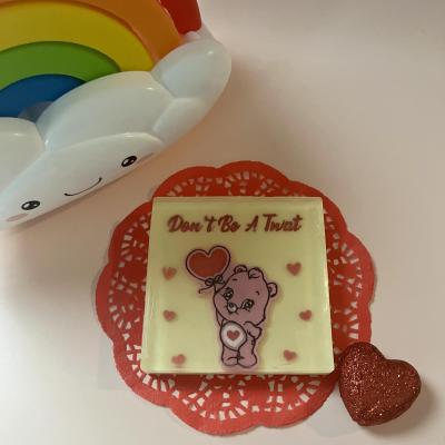 Care bears inspired handmade soap that reads “dont be a twat”